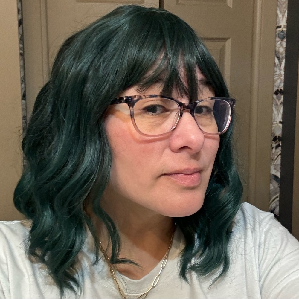 Short green and black wig, unsure of name brand